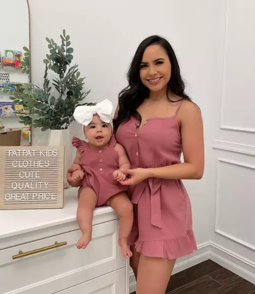 Lisa Morales Duke with her baby daughter