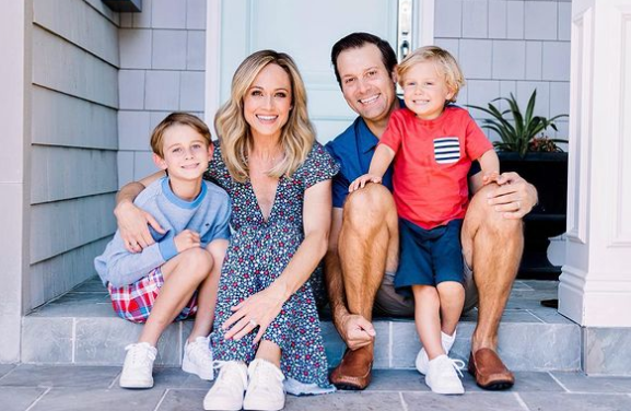 Actress Nikki DeLoach with her husband and sons