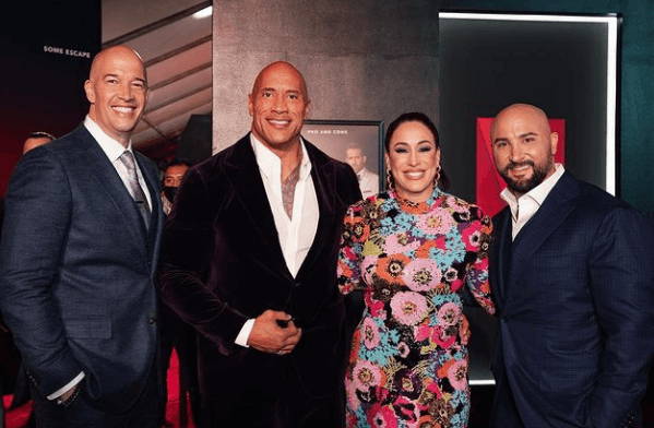 Dave Rienzi with his wife Dany Garcia and The Rock